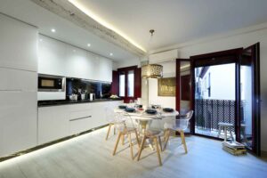 dining table set for six people in boutique short term apartment rental albaicin, granada spain