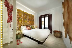 double bedroom with Indian headboard in fancy apartment for rent, albayzin, granada, spain