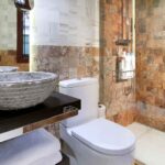 spanish marble walls in bathroom of rental accommodation in Granada Spain